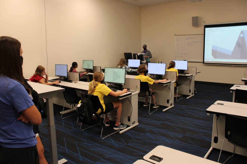 Students studying CAD